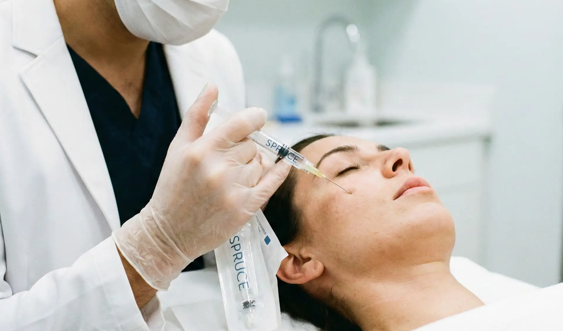 Aesthetic medicine physician using a cannula during an injectable procedure in a clinic